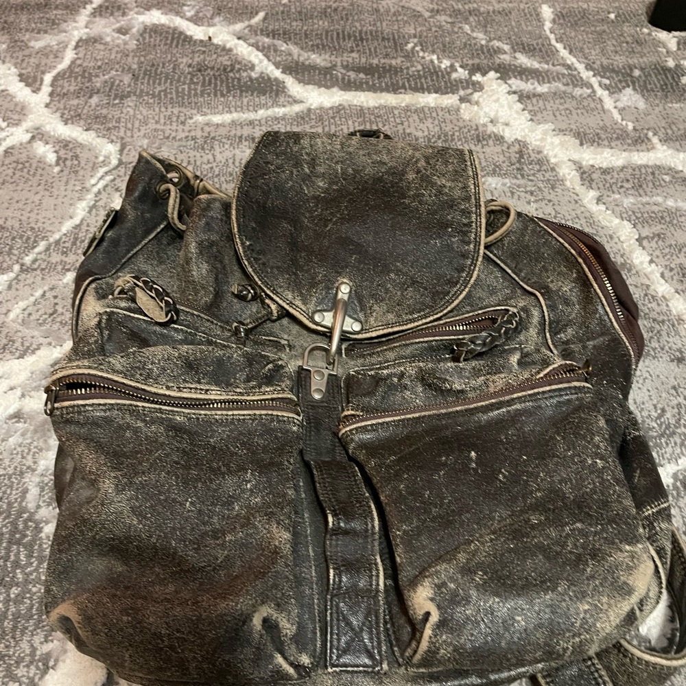 DKNY DISTRESSED DARK GREY drawstring backback. Huge hold's alot